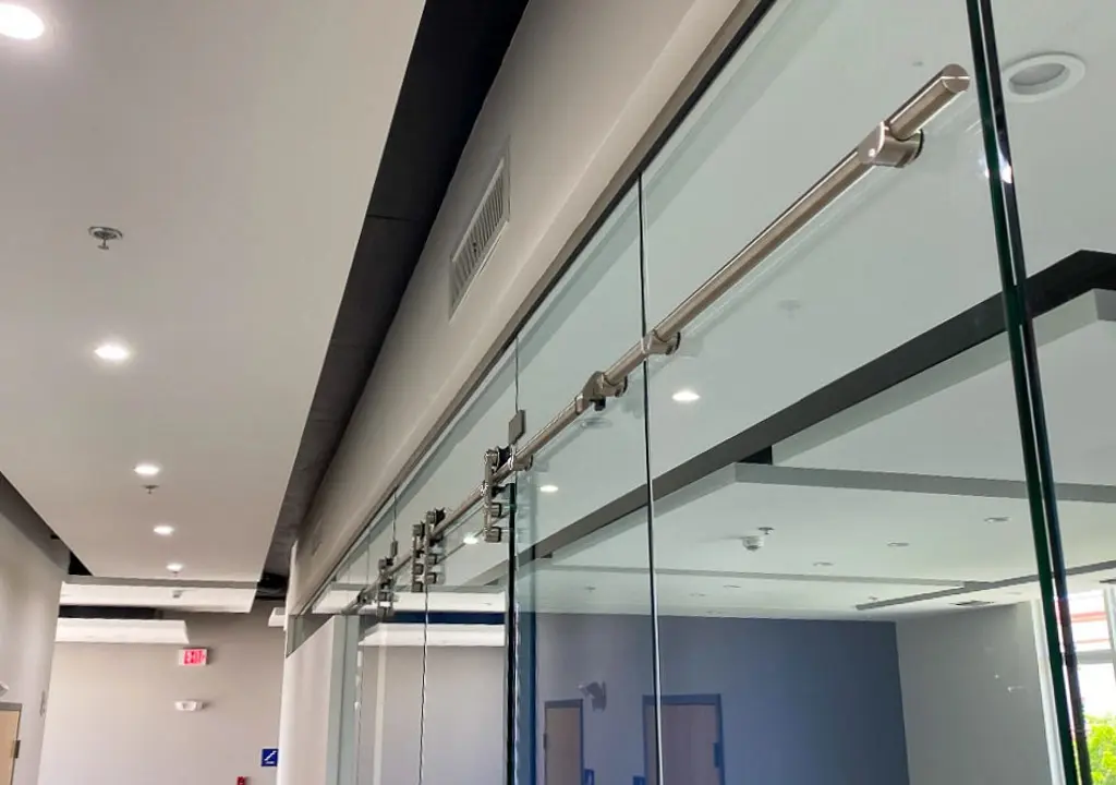 Decorative impact front door with custom glass design